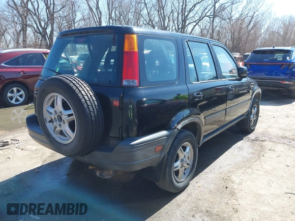 1999 Honda CR-V EX with VIN JHLRD1863XC049666, listed as a IAAI auction lot 41731848 with 153,071 mi miles. Bid and sale history available at carsss.com. Image 4.