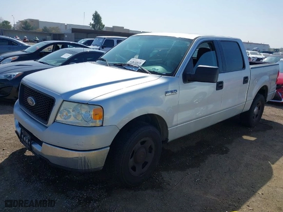 2005 Ford F-150 XLT with VIN 1FTPW12595FB54061, listed as a IAAI auction lot 41872078 with 174,399 mi miles. Bid and sale history available at carsss.com. Image 2.