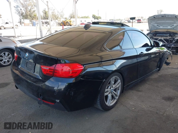 2014 BMW 4 Series 428i with VIN WBA3N7C51EK220125, listed as a IAAI auction lot 41881928 with 129,810 mi miles and . Bid and sale history available at carsss.com. Image 4.