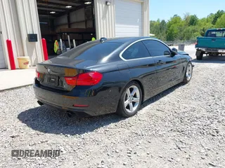 2016 BMW 4 Series 428i with VIN WBA3N7C55GK227677, listed as a IAAI auction lot 42048025 with 82,078 mi miles and . Bid and sale history available at carsss.com. Image 4.