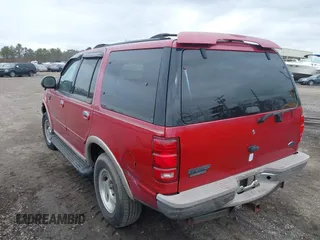 1999 Ford Expedition XLT z VIN 1FMPU18L7XLC51478, wystawiony jako IAAI lot #41679788 z przebiegiem Nie podano mil oraz . Historia ofert i sprzedaży dostępna na DreamBid. Obrazek 3.