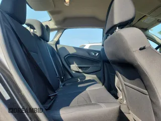 2015 Ford Fiesta SE z VIN 3FADP4BJ2FM161312, wystawiony jako Copart lot #59104495 z przebiegiem 110 583 mil mil oraz Szkoda całkowita • Salvage title. Historia ofert i sprzedaży dostępna na DreamBid. Obrazek 10.