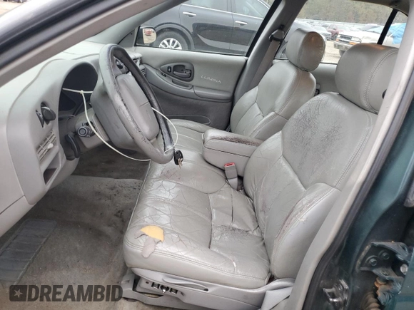 1997 Chevrolet Lumina LS with VIN 2G1WL52M3V9163567, listed as a Copart auction lot 82772324 with 191,852 mi miles and Salvage Title. Bid and sale history available at DreamBid. Image 7.