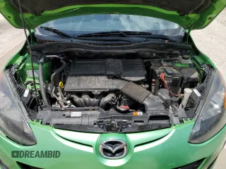 2012 Mazda 2 Sport with VIN JM1DE1KZ5C0141784, listed as a Copart auction lot 56498295 with 132,602 mi miles and Salvage Title. Bid and sale history available at DreamBid. Image 11.