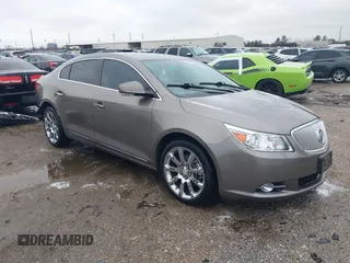 2012 Buick LaCrosse Touring with VIN 1G4GJ5E39CF218396, listed as a IAAI auction lot 41408383 with 53,873 mi miles and . Bid and sale history available at DreamBid. Image 1.