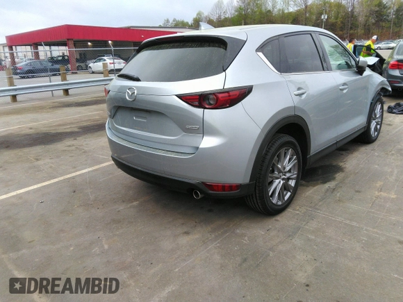2019 Mazda CX-5 Grand Touring with VIN JM3KFADM2K1631928, listed as a IAAI auction lot 41961695 with 41,190 mi miles. Bid and sale history available at carsss.com. Image 4.