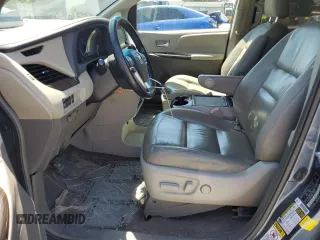 2015 Toyota Sienna XLE with VIN 5TDYK3DCXFS676402, listed as a Copart auction lot 54733845 with 173,044 mi miles and Salvage Title. Bid and sale history available at DreamBid. Image 7.
