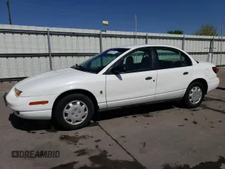 2002 Saturn SL z VIN 1G8ZH52882Z253088, wystawiony jako Copart lot #55062225 z przebiegiem 177 866 mil mil oraz Szkoda całkowita • Salvage title. Historia ofert i sprzedaży dostępna na DreamBid. Obrazek 1.