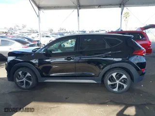 2017 Hyundai Tucson Value with VIN KM8J33A28HU484898, listed as a IAAI auction lot 41847105 with 53,210 mi miles. Bid and sale history available at carsss.com. Image 14.