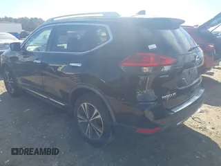2017 Nissan Rogue S with VIN JN8AT2MV2HW013018, listed as a IAAI auction lot 41693946 with 128,667 mi miles and . Bid and sale history available at DreamBid. Image 3.