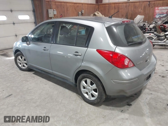 2009 Nissan Versa 1.8 SL with VIN 3N1BC13E99L409551, listed as a IAAI auction lot 41628375 with 214,873 mi miles. Bid and sale history available at carsss.com. Image 3.