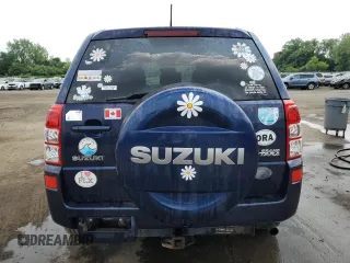 2012 Suzuki Grand Vitara Limited with VIN JS3TD0D74C4100125, listed as a Copart auction lot 58935355 with 218,085 mi miles and Salvage title. Bid and sale history available at DreamBid. Image 6.