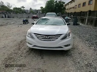 2013 Hyundai Sonata Limited z VIN 5NPEC4AC0DH689589, wystawiony jako Copart lot #59900595 z przebiegiem 113 269 mil mil oraz Szkoda całkowita • Salvage title. Historia ofert i sprzedaży dostępna na DreamBid. Obrazek 13.