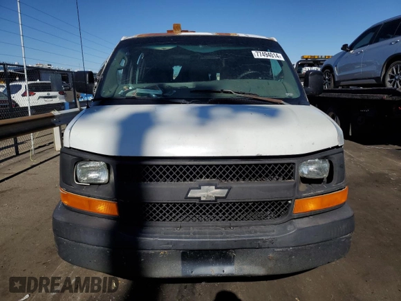 2005 Chevrolet Express Cargo z VIN 1GCFG15X751112877, wystawiony jako Copart lot #77494014 z przebiegiem 349 555 mil mil oraz Czysty tytuł • Clean title. Historia ofert i sprzedaży dostępna na DreamBid. Obrazek 5.