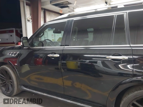 2014 Infiniti QX80 with VIN JN8AZ2NF2E9555963, listed as a IAAI auction lot 41894699 with 143,255 mi miles. Bid and sale history available at carsss.com. Image 14.