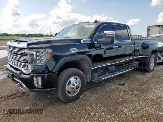 2020 GMC Sierra 3500HD Denali z VIN 1GT49WEY1LF252561, wystawiony jako Copart lot #57614395 z przebiegiem 108 216 mil mil oraz Tytuł czysty. Historia ofert i sprzedaży dostępna na DreamBid. Obrazek 1.