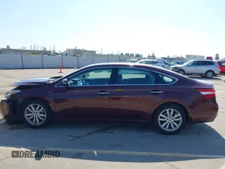 2015 Toyota Avalon Limited with VIN 4T1BK1EB6FU164272, listed as a IAAI auction lot 41891894 with 207,847 mi miles and . Bid and sale history available at DreamBid. Image 14.