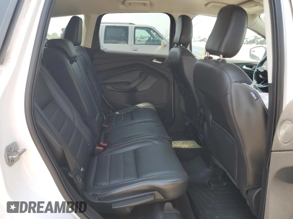 2019 Ford Escape Titanium z VIN 1FMCU9J93KUA51020, wystawiony jako Copart lot #60462495 z przebiegiem 59 998 mil mil oraz Szkoda całkowita • Salvage title. Historia ofert i sprzedaży dostępna na DreamBid. Obrazek 10.