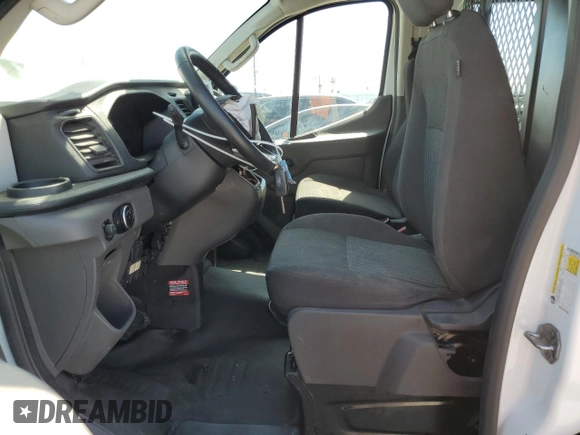 2020 Ford Transit Cargo z VIN 1FTBR1Y86LKB13703, wystawiony jako Copart lot #58082035 z przebiegiem 24 117 mil mil oraz Tytuł czysty. Historia ofert i sprzedaży dostępna na DreamBid. Obrazek 7.