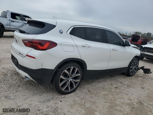 2023 BMW X2 sDrive28i with VIN WBXYH9C00P5V38984, listed as a Copart auction lot 89321155 with 47,287 mi miles and Salvage Title. Bid and sale history available at carsss.com. Image 3.