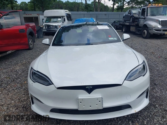 2021 Tesla Model S Plaid z VIN 5YJSA1E62MF452838, wystawiony jako IAAI lot #42726183 z przebiegiem 21 725 mil mil oraz . Historia ofert i sprzedaży dostępna na DreamBid. Obrazek 12.