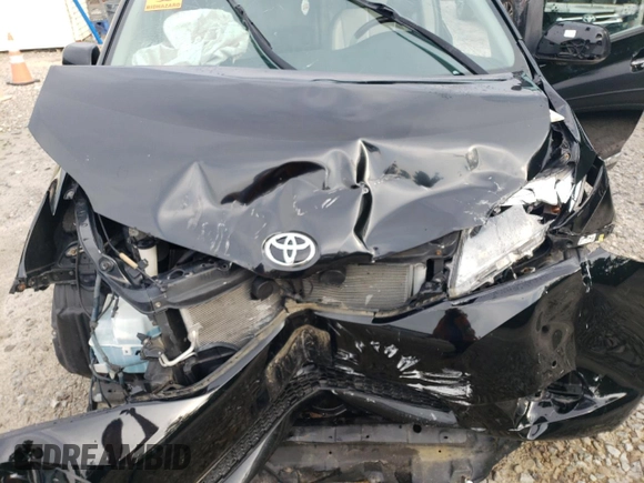2011 Toyota Sienna XLE with VIN 5TDDK3DC8BS020059, listed as a Copart auction lot 62954985 with 219,974 mi miles and Salvage title. Bid and sale history available at DreamBid. Image 12.