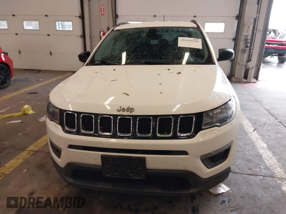 2018 Jeep Compass Sport with VIN 3C4NJCAB6JT124198, listed as a IAAI auction lot 41192196 with 104,557 mi miles. Bid and sale history available at carsss.com. Image 12.