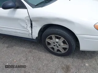 2007 Ford Taurus SE z VIN 1FAFP53U57A101188, wystawiony jako IAAI lot #42102585 z przebiegiem Nie podano mil oraz . Historia ofert i sprzedaży dostępna na DreamBid. Obrazek 6.