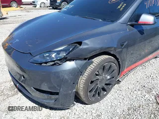 2021 Tesla Model Y Performance with VIN 5YJYGDEF1MF268405, listed as a IAAI auction lot 41818331 with 43,621 mi miles and . Bid and sale history available at DreamBid. Image 6.