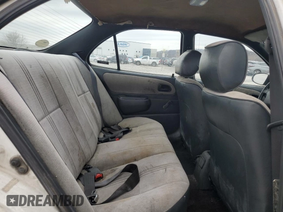 1997 Geo Prizm z VIN 1Y1SK526XVZ437486, wystawiony jako Copart lot #86422384 z przebiegiem 404 485 mil mil oraz Tytuł czysty. Historia ofert i sprzedaży dostępna na DreamBid. Obrazek 10.
