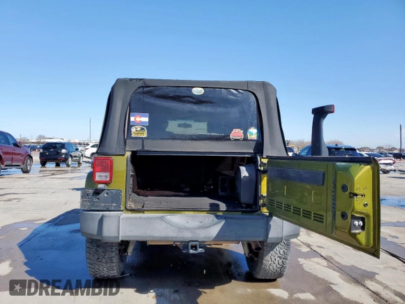 2007 Jeep Wrangler Unlimited Sahara z VIN 1J4GB591X7L165493, wystawiony jako Copart lot #47468205 z przebiegiem Nie podano mil oraz Czysty tytuł • Clean title. Historia ofert i sprzedaży dostępna na DreamBid. Obrazek 6.