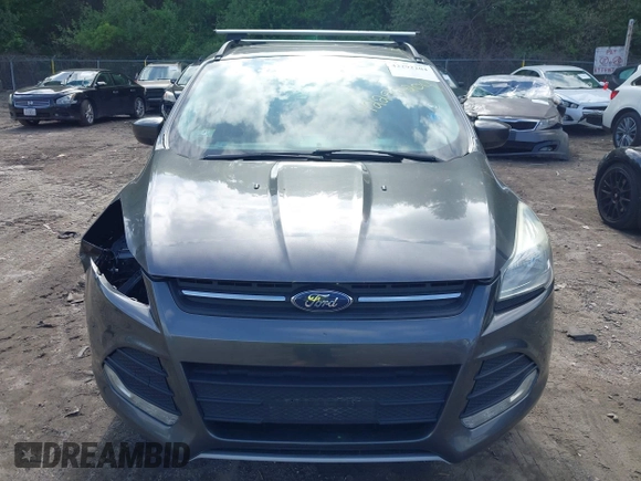 2016 Ford Escape SE с VIN 1FMCU9GX6GUB27794, выставлен на аукционе IAAI как лот 42292204 с пробегом 186 434 миль миль и . История ставок и продаж доступна на DreamBid. Изображение 13.