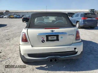 2010 MINI Convertible S z VIN WMWMS3C58ATY50783, wystawiony jako Copart lot #48240035 z przebiegiem 70 110 mil mil oraz Czysty tytuł • Clean title. Historia ofert i sprzedaży dostępna na DreamBid. Obrazek 6.