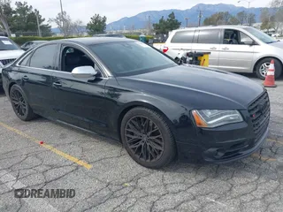 2013 Audi S8 with VIN WAUD2AFD0DN028673, listed as a IAAI auction lot 41689320 with 115,502 mi miles. Bid and sale history available at carsss.com. Image 1.