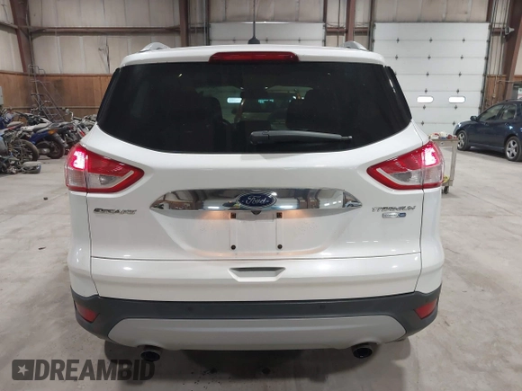 2016 Ford Escape Titanium with VIN 1FMCU9J95GUB02377, listed as a IAAI auction lot 41869557 with 88,441 mi miles. Bid and sale history available at carsss.com. Image 16.