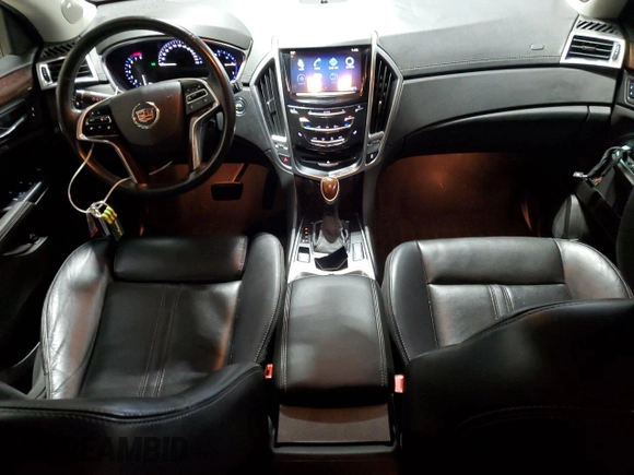 2015 Cadillac SRX Luxury Collection z VIN 3GYFNEE32FS612210, wystawiony jako Copart lot #57770995 z przebiegiem 118 754 mil mil oraz Szkody całkowita. Historia ofert i sprzedaży dostępna na DreamBid. Obrazek 8.