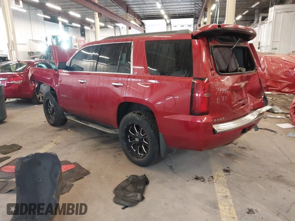 2015 Chevrolet Tahoe LT with VIN 1GNSKBKC9FR224692, listed as a IAAI auction lot 41922047 with 138,816 mi miles and . Bid and sale history available at DreamBid. Image 3.