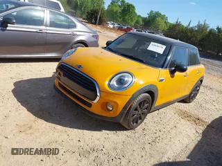2016 MINI Hardtop 4 Door with VIN WMWXU1C58G2D08712, listed as a IAAI auction lot 42038278 with 96,874 mi miles and . Bid and sale history available at DreamBid. Image 2.