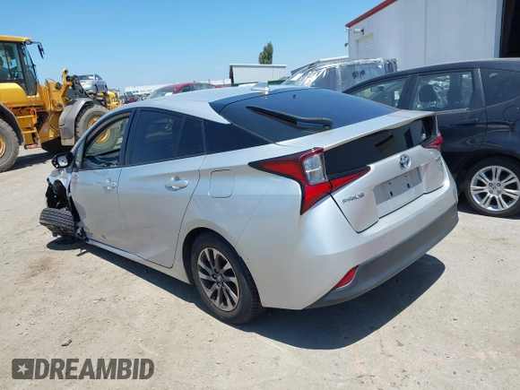 2022 Toyota Prius L Eco with VIN JTDKAMFU5N3188107, listed as a IAAI auction lot 42223649 with 180,894 mi miles and . Bid and sale history available at DreamBid. Image 3.