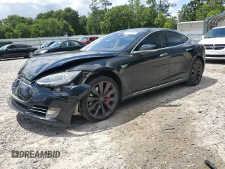 2013 Tesla Model S Performance с VIN 5YJSA1CP8DFP20786, выставлен на аукционе Copart как лот 61035395 с пробегом 140 119 миль миль и Списание • Salvage title. История ставок и продаж доступна на DreamBid. Изображение 1.