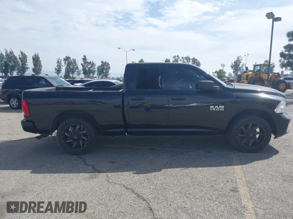 2016 Ram 1500 Express z VIN 1C6RR6FG5GS333031, wystawiony jako IAAI lot #42195110 z przebiegiem 144 921 mil mil oraz . Historia ofert i sprzedaży dostępna na DreamBid. Obrazek 13.