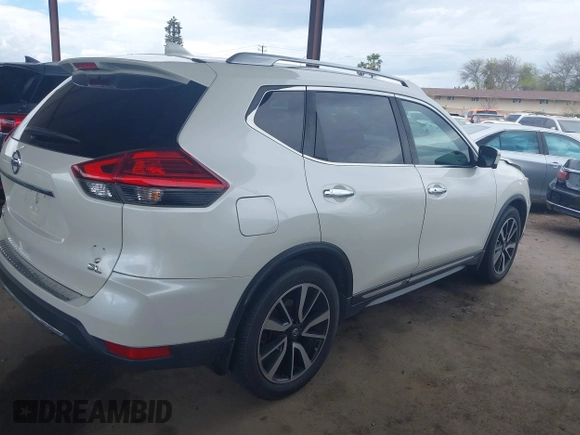2017 Nissan Rogue SL with VIN JN8AT2MT7HW143035, listed as a IAAI auction lot 41771987 with 77,696 mi miles and . Bid and sale history available at DreamBid. Image 4.