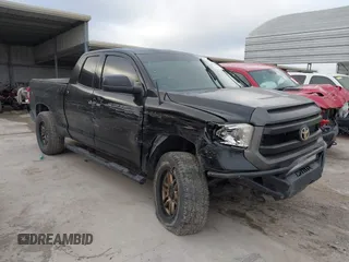 2014 Toyota Tundra 4WD Truck SR with VIN 5TFUM5F14EX051843, listed as a IAAI auction lot 41773983 with 145,089 mi miles. Bid and sale history available at carsss.com. Image 1.