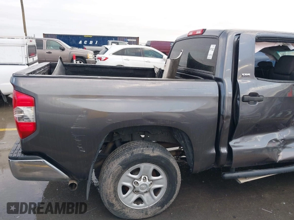2014 Toyota Tundra SR5 z VIN 5TFEM5F16EX082421, wystawiony jako IAAI lot #40735426 z przebiegiem 173 005 mil mil oraz . Historia ofert i sprzedaży dostępna na DreamBid. Obrazek 18.