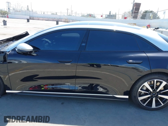 2023 Lucid Air Grand Touring z VIN 50EA1GBA0PA004565, wystawiony jako IAAI lot #41913843 z przebiegiem 25 468 mil mil oraz . Historia ofert i sprzedaży dostępna na DreamBid. Obrazek 15.