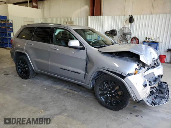 2021 Jeep Grand Cherokee Laredo X with VIN 1C4RJEAG3MC657750, listed as a Copart auction lot 51241965 with 31,314 mi miles and Salvage title. Bid and sale history available at DreamBid. Image 4.