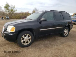 2007 GMC Envoy SLT with VIN 1GKDT13S972197393, listed as a Copart auction lot 77958764 with 151,586 mi miles and Salvage Title. Bid and sale history available at DreamBid. Image 1.