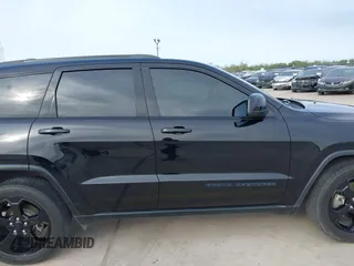 2018 Jeep Grand Cherokee Altitude with VIN 1C4RJFAG9JC436848, listed as a IAAI auction lot 42303459 with 124,044 mi miles and . Bid and sale history available at DreamBid. Image 13.