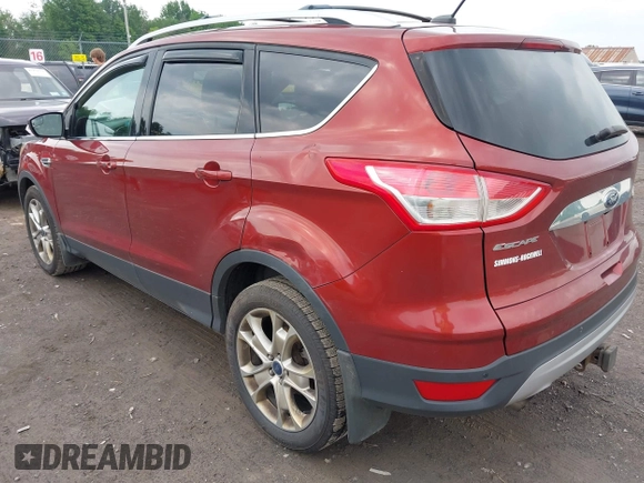 2015 Ford Escape Titanium z VIN 1FMCU9J98FUC84963, wystawiony jako IAAI lot #42469112 z przebiegiem 128 838 mil mil oraz . Historia ofert i sprzedaży dostępna na DreamBid. Obrazek 3.