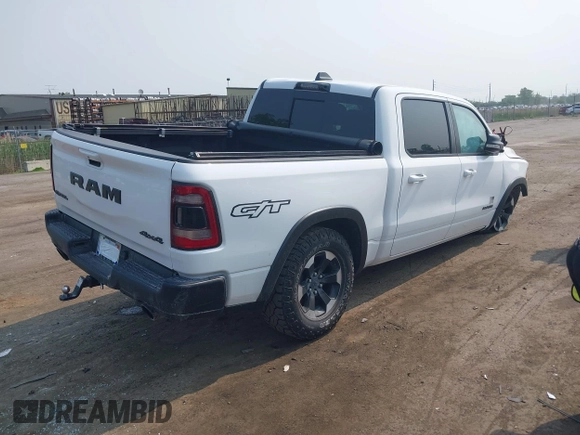 2022 Ram 1500 Rebel with VIN 1C6SRFLT5NN318494, listed as a IAAI auction lot 42413194 with 59,458 mi miles and . Bid and sale history available at DreamBid. Image 4.